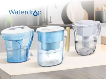 Waterdrop water filter pitchers displayed on a kitchen countertop, showcasing three different models in blue and white colors, designed for improved drinking water quality.