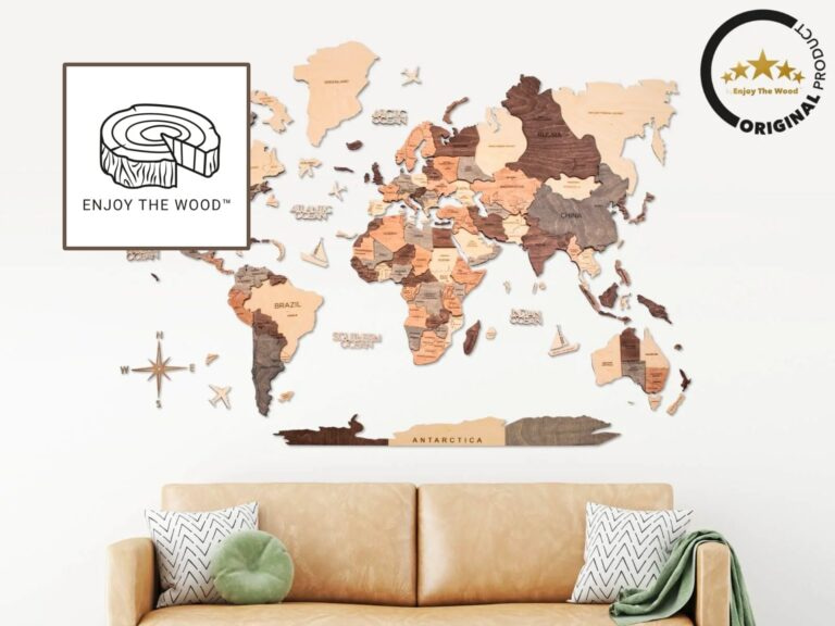 World Map Wall Art In Earthy Tones Displayed Above A Modern Beige Couch, Featuring An Illustration Of A Sandwich And A Decorative Emblem In The Corner.