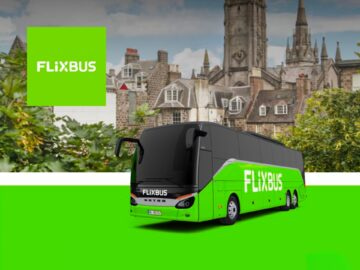 FlixBus coach parked in front of a historical cityscape, featuring a prominent tower and greenery, promoting affordable travel options.