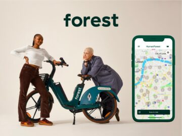 Two people posing with a green bike next to a smartphone displaying a map of bike routes, promoting sustainable transportation with the word "forest" featured prominently above.